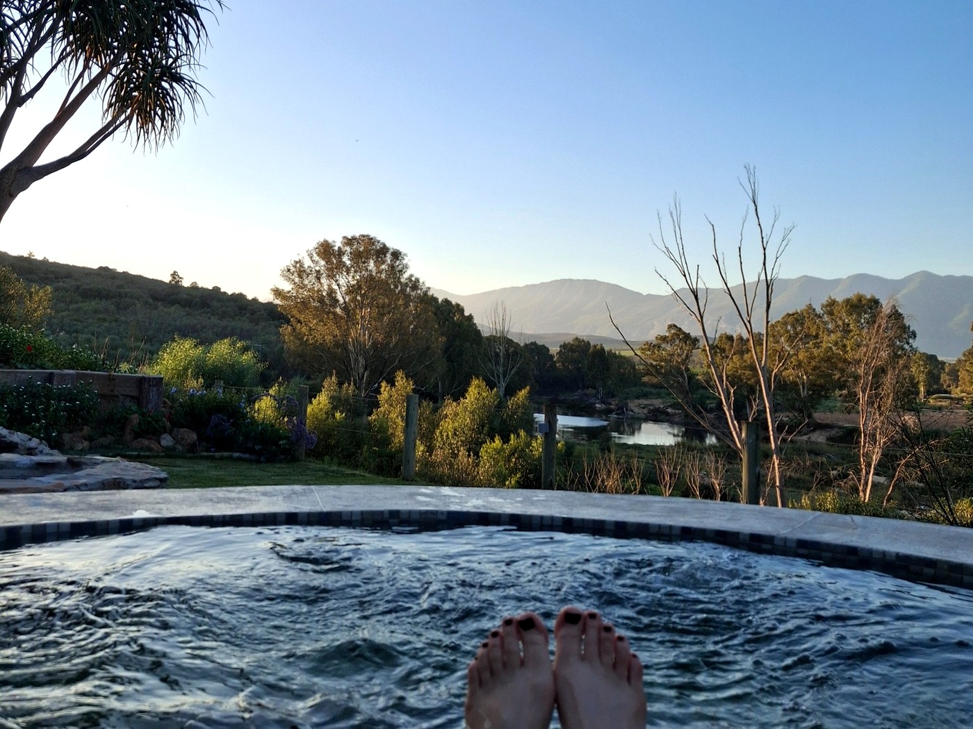 Jacuzzi overlooking the river at Riverhide